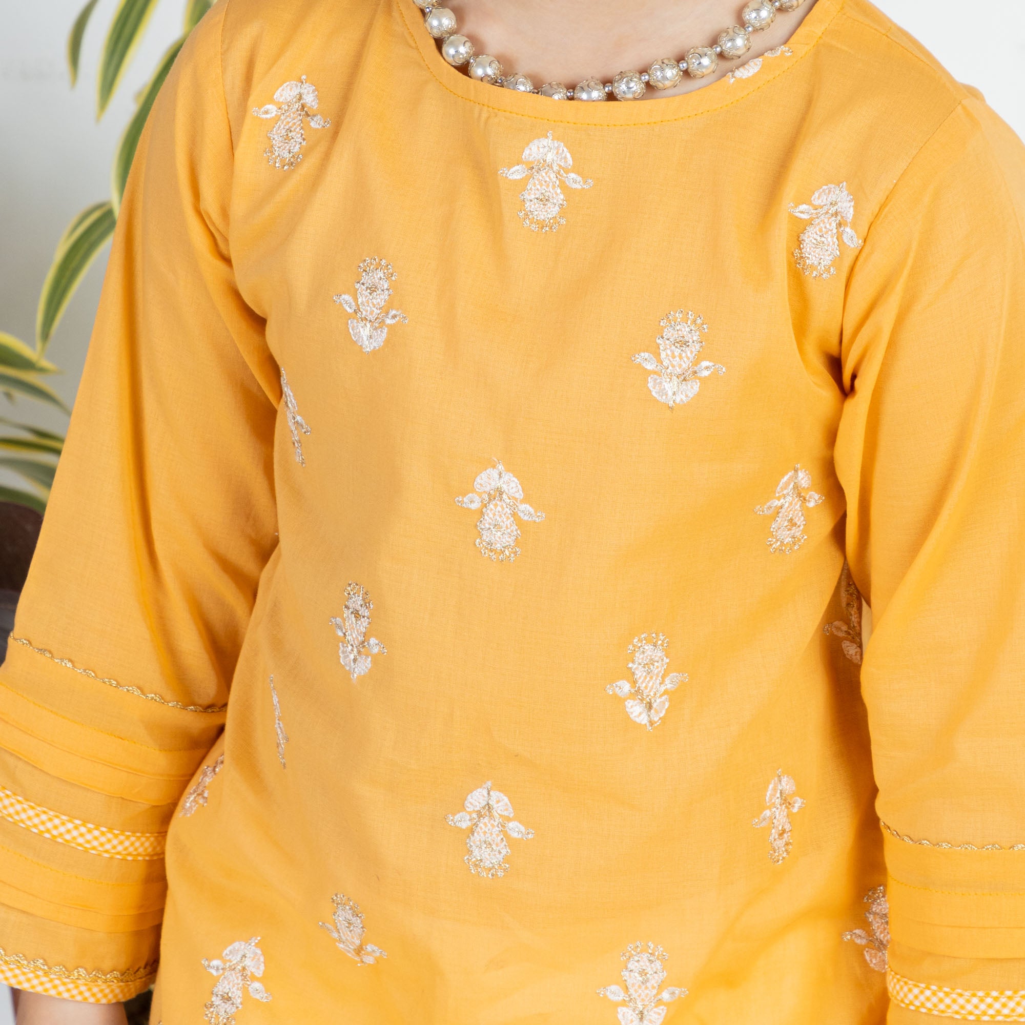 Lustrous Yellow Embroidered Kurti